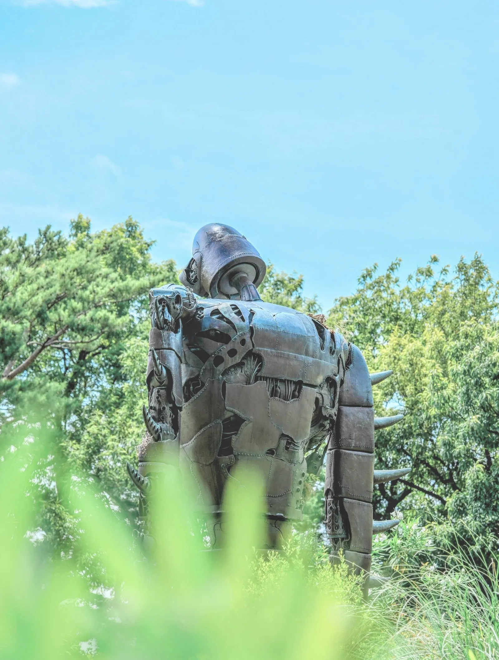 The Robot Soldier statue above the trees of the Ghibli Museum